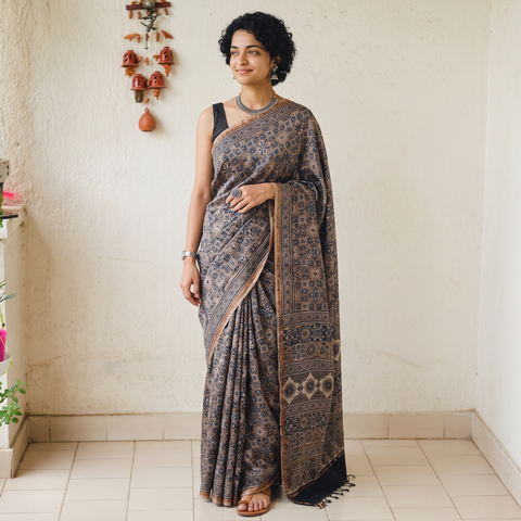 Peach Hand Block Print Natural Dyed Chanderi Silk Ajrakh Saree, draped and worn by a woman, AI visual of the saree, iTokri