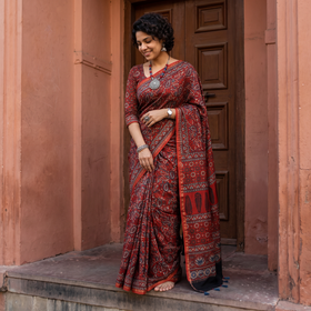 Red Hand Block Print Natural Dyed Chanderi Silk Ajrakh Saree, draped and worn by a woman, AI visual of the saree, iTokri