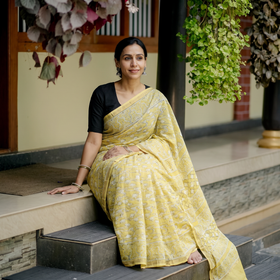 Yellow Hand Block Print Natural Dyed Chanderi Silk Akola Saree, draped and worn by a woman, AI visual of the saree, iTokri