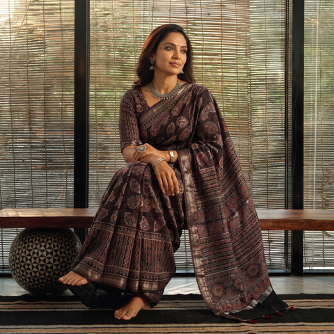Brown Hand Block Print Natural Dyed Maheshwari Silk Ajrakh Saree, draped and worn by a woman, AI visual of the saree, iTokri