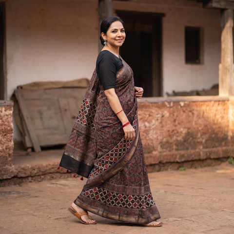 Brown Hand Block Print Natural Dyed Maheshwari Silk Ajrakh Saree, draped and worn by a woman, AI visual of the saree, iTokri