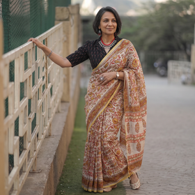 Multicolor hand block printed Chanderi silk Sanganeri saree, draped and worn by a woman, AI visual of the saree, iTokri