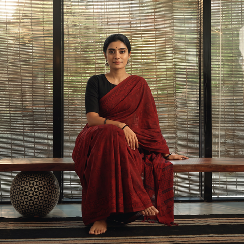Red Hand Block Printed Cotton Bagh Saree, draped and worn by a woman, AI visual of the saree, iTokri