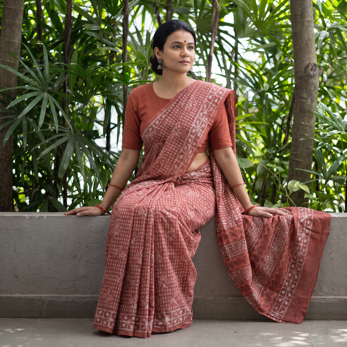 Red Hand Block Pure Mul Cotton Batik Print Saree, draped and worn by a woman, AI visual of the saree, iTokri