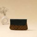 Hand clutch with embossed leather flap 10 - handcrafted