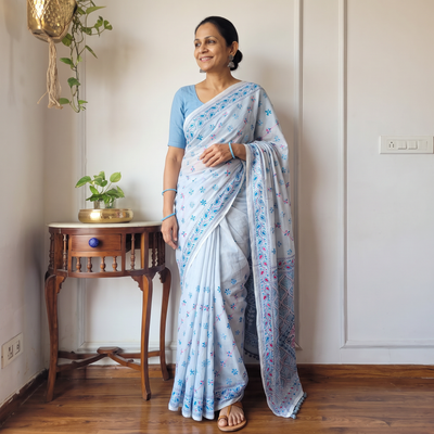 Blue Hand Embroidered Chanderi Silk Chapa Work Phulkari Saree, draped and worn by a woman, AI visual of the saree, iTokri