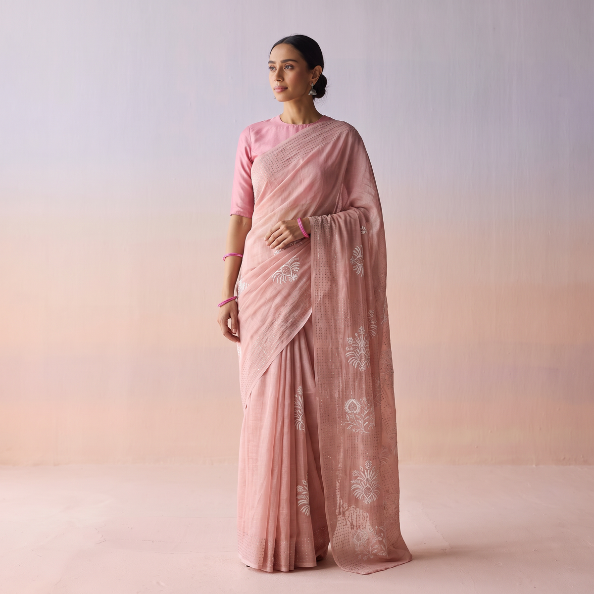Pink Hand Embroidered Chanderi Silk Zari Border Chikankari Lucknowi Saree, draped and worn by a woman, AI visual of the saree, iTokri