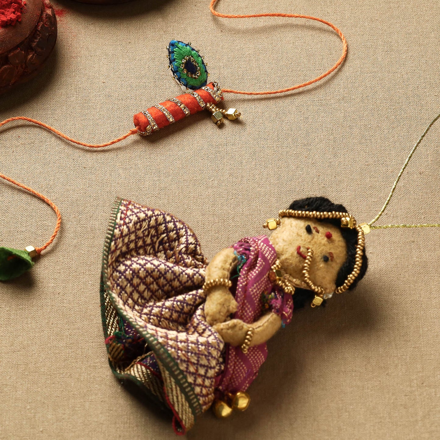 Buy Hand Embroidered Felt Work Radha Krishna Rakhi & Lumba Set 