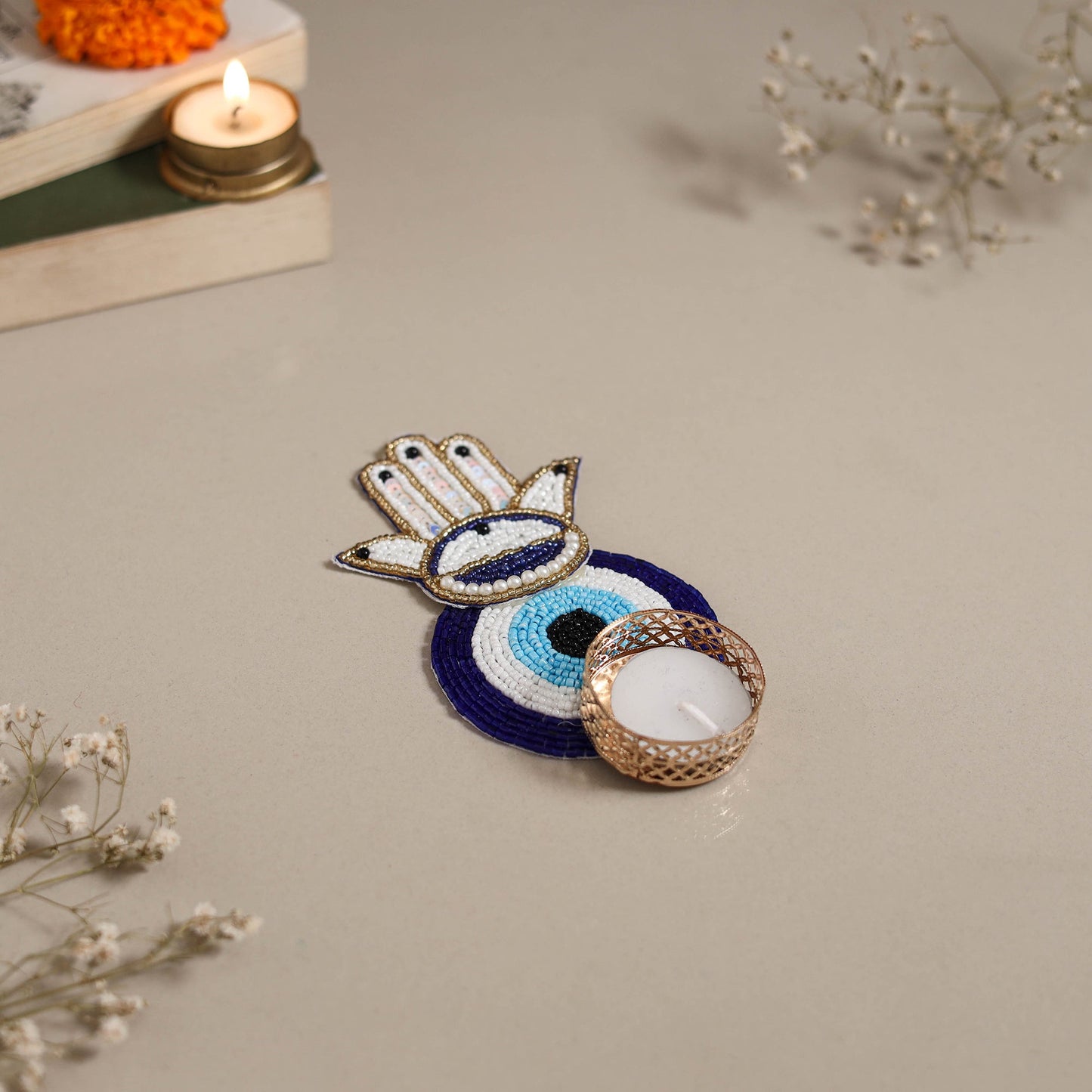 Hand embroidered hamsa evil eye beaded tealight candle