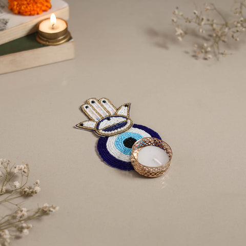 Hand embroidered hamsa evil eye beaded tealight candle