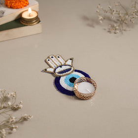 Hand embroidered hamsa evil eye beaded tealight candle