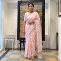 Pink Hand Embroidered Kota Doria Cotton Lucknowi Chikankari Saree with Border, draped and worn by a woman, AI visual of the saree, iTokri