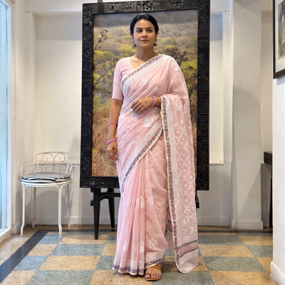 Pink Hand Embroidered Kota Doria Cotton Lucknowi Chikankari Saree with Border, draped and worn by a woman, AI visual of the saree, iTokri