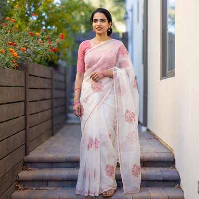 White Hand Embroidered Organza Silk Beadwork Chikankari Lucknowi Saree, draped and worn by a woman, AI visual of the saree, iTokri