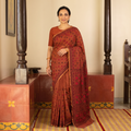 Red Hand Embroidered Silk Cotton Chapa Work Saree, draped and worn by a woman, AI visual of the saree, iTokri