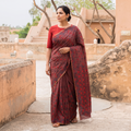 Brown Hand Embroidered Silk Cotton Chapa Work Saree, draped and worn by a woman, AI visual of the saree, iTokri