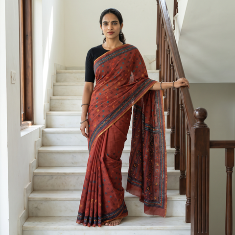 Red Hand Embroidered Silk Cotton Chapa Work Saree, draped and worn by a woman, AI visual of the saree, iTokri