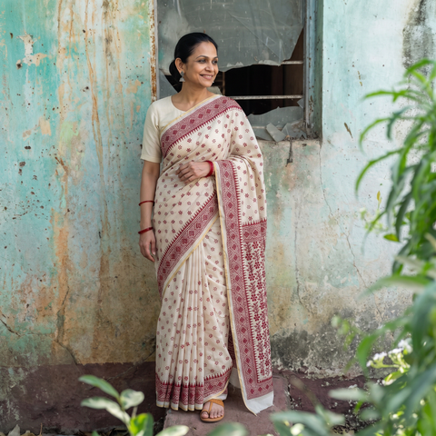 White Hand Embroidered Silk Cotton Chapa Work Saree, draped and worn by a woman, AI visual of the saree, iTokri