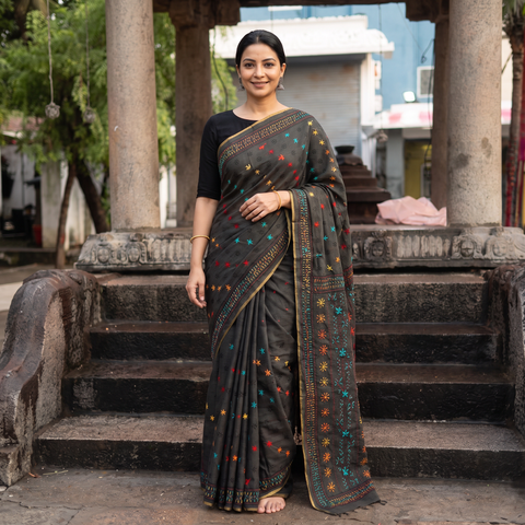 Black Hand Embroidered Silk Cotton Chapa Work Saree, draped and worn by a woman, AI visual of the saree, iTokri