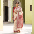 White Hand Embroidered Silk Cotton Chapa Work Saree, draped and worn by a woman, AI visual of the saree, iTokri