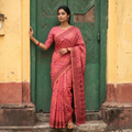 Pink Hand Embroidered Silk Cotton Chapa Work Saree, draped and worn by a woman, AI visual of the saree, iTokri