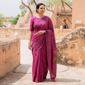 Pink Hand Embroidered Silk Saree, draped and worn by a woman, AI visual of the saree, iTokri