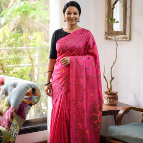 Pink Hand Embroidered Silk Saree, draped and worn by a woman, AI visual of the saree, iTokri