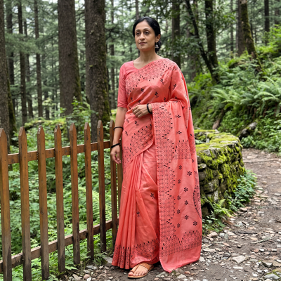 Pink Hand Embroidered Silk Saree, draped and worn by a woman, AI visual of the saree, iTokri