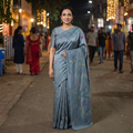 Grey Hand Embroidered Silk Saree, draped and worn by a woman, AI visual of the saree, iTokri