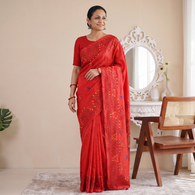 Red Hand Embroidered Silk Saree, draped and worn by a woman, AI visual of the saree, iTokri