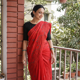 Red Hand Embroidered Silk Saree, draped and worn by a woman, AI visual of the saree, iTokri