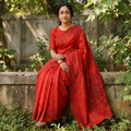 Red Hand Embroidered Silk Saree, draped and worn by a woman, AI visual of the saree, iTokri