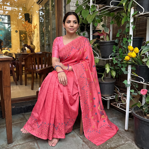 Pink Hand Embroidered Silk Saree, draped and worn by a woman, AI visual of the saree, iTokri