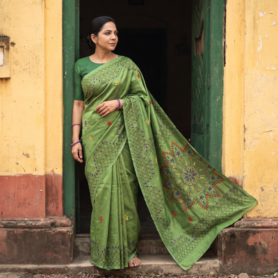 Green Hand Embroidered Silk Saree, draped and worn by a woman, AI visual of the saree, iTokri