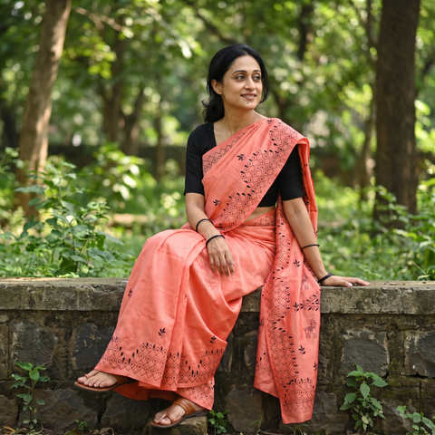 Peach Hand Embroidered Silk Saree, draped and worn by a woman, AI visual of the saree, iTokri