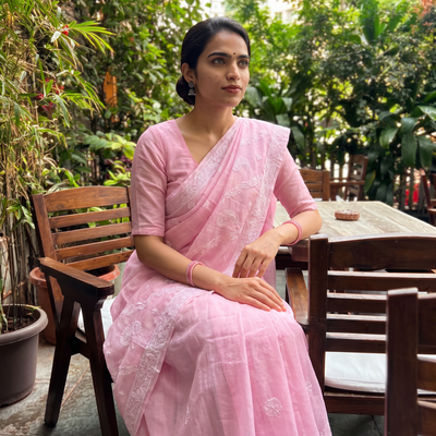Pink Hand Embroidered Terivoile Cotton Lucknowi Chikankari Saree, draped and worn by a woman, AI visual of the saree, iTokri