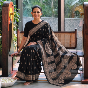 Black Hand Embroidery Bangalore Silk Handloom Bengal Kantha Saree, draped and worn by a woman, AI visual of the saree, iTokri