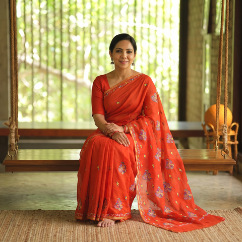 Orange Hand Embroidery Pure Chanderi Silk Block Printed Kashida Saree, draped and worn by a woman, AI visual of the saree, iTokri