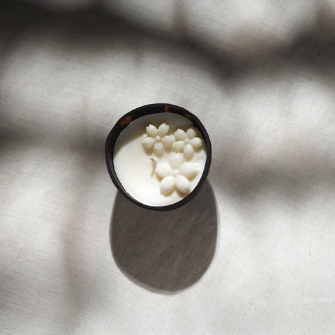 Handcrafted eco-friendly coconut shell jasmine soy scented