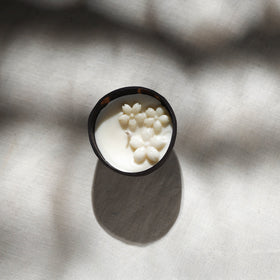 Handcrafted eco-friendly coconut shell jasmine soy scented