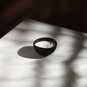 Handcrafted eco-friendly coconut shell jasmine soy scented