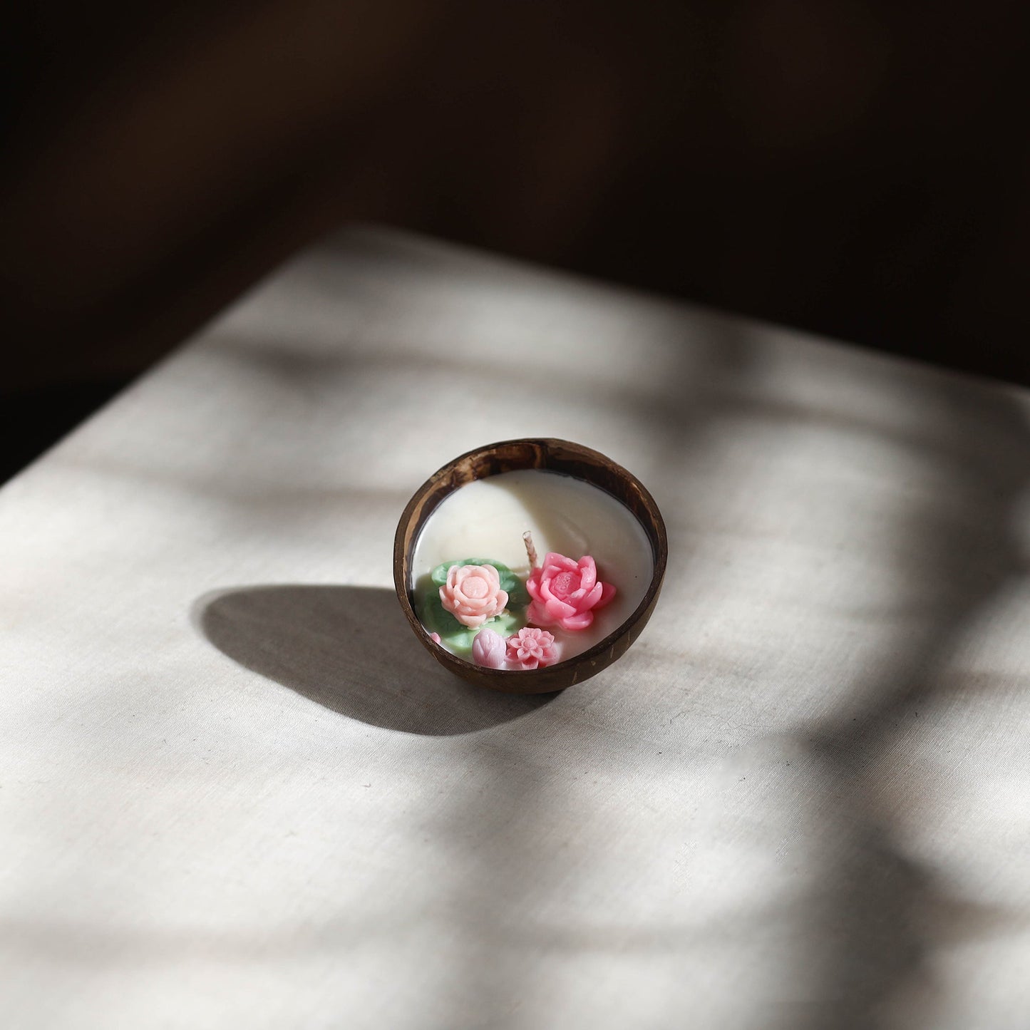 Handcrafted eco-friendly coconut shell rose soy scented