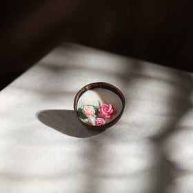 Handcrafted eco-friendly coconut shell rose soy scented