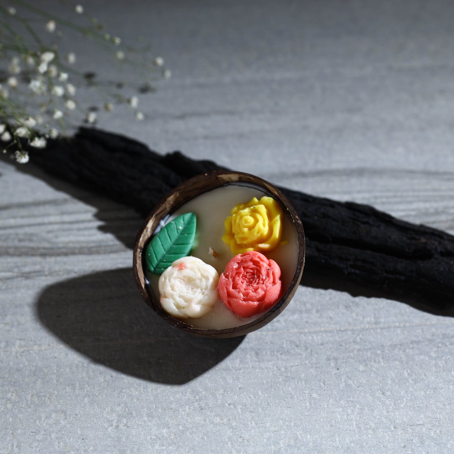 Handcrafted eco-friendly coconut shell rose soy scented