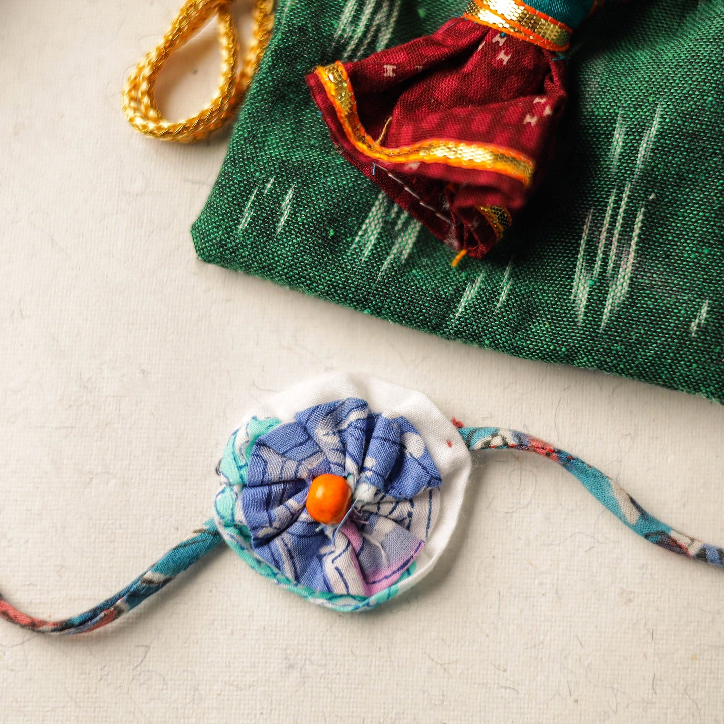 Buy Handcrafted Flower Bead Work Fabart Rakhi 50 Online at iTokri.com