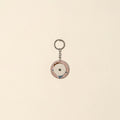 Handcrafted jute fabric embellished wood keychain 12