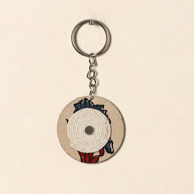 Handcrafted jute fabric embellished wood keychain 16