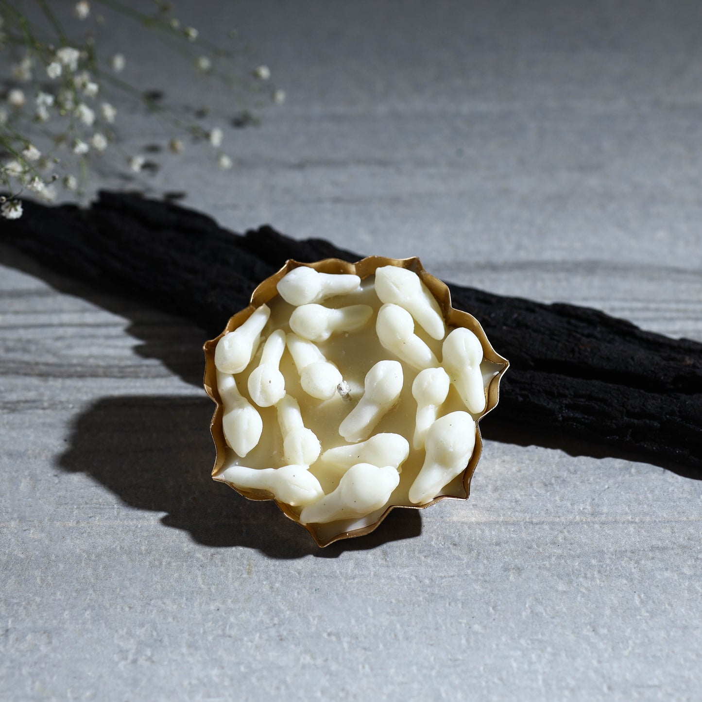 Handcrafted metal urli soy wax mogra scented candle