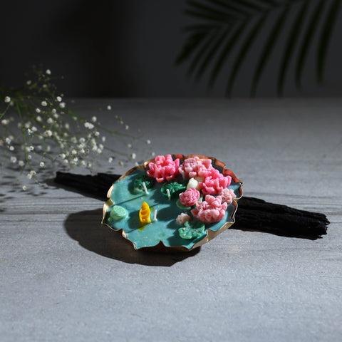 Handcrafted metal urli water lily pond soy wax scented