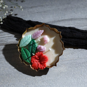 Handcrafted metal urli water lily pond soy wax scented